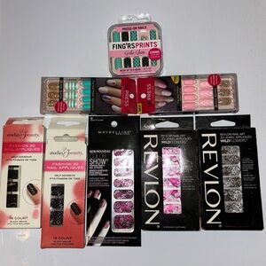 8 pcs Misc. Nail decals and press on nail kits.